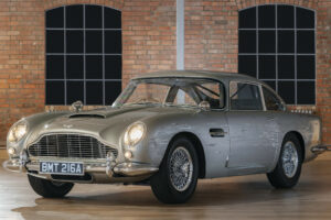 Photo of Aston Martin stunt car, Daniel Craig costumes star at James Bond auction