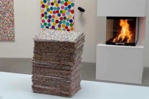 Photo of Damien Hirst burns artworks after collectors pick their NFTs instead