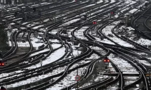 Photo of UK shoppers and workers kept home by rail strikes and cold snap
