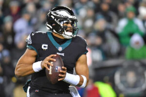 Photo of Jalen Hurts, Eagles land top playoff seed in National Football Conference by beating NY Giants