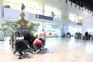 Photo of DMW assists stranded overseas Filipino workers in rebooking, contacting employers