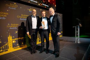Photo of Business Champion Awards triumph for coach Polston