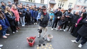 Photo of German artist nearing 100,000 cobblestones to mark victims of Nazis