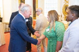 Photo of Belfast young person Jemma Simpson meets His Majesty The King after winning national Princes Trust award