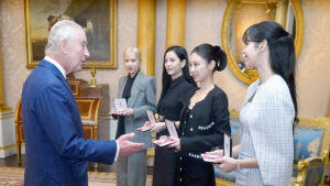 Photo of K-Pop band BLACKPINK receives honorary MBEs from Britain’s King Charles