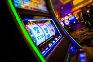 Photo of How the Sounds and Lights of Slot Machines Keep You Playing Longer